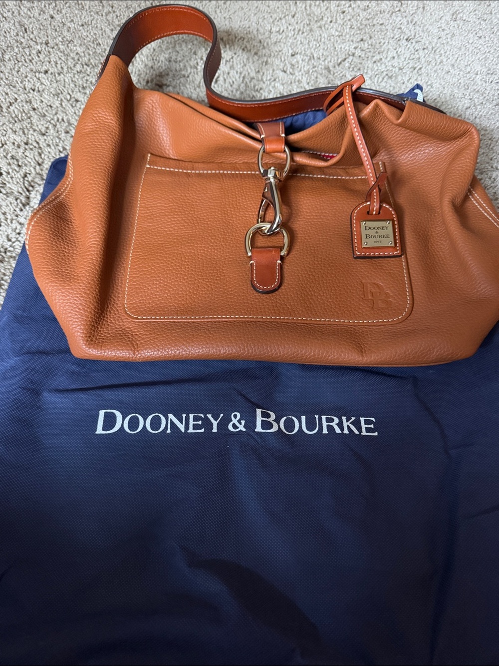 Dooney & Bourke Pebbled Leather Messenger Bag in Cognac Brown